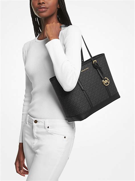 sac michael kors jet set travel pas cher|Jet Set Travel Small Signature Logo and Metallic Messenger Bag.